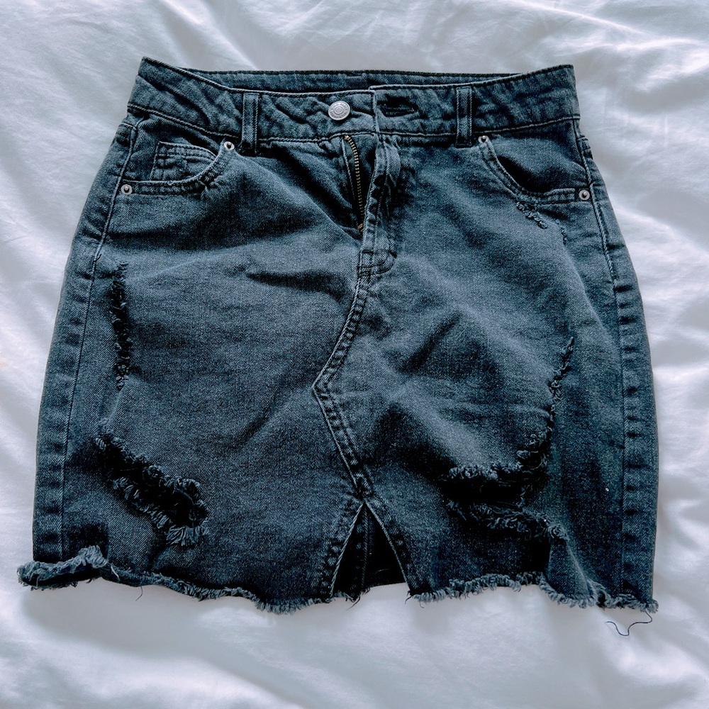 Black distress denim skirt